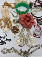 Full layout of assorted jewelry pieces