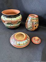 overview of all three pottery items: bowl, cup, lidded dish with lid removed