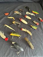 All lures laid out on black cloth