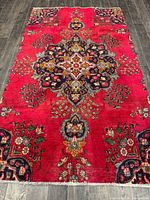 Full view of rug showing pattern and colors