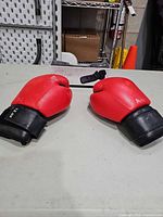 pair of red 12 oz boxing gloves top view