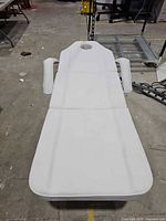 Top view of massage table showing face hole, three sections