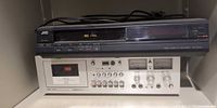 Akai cassette deck stacked beneath JVC VCR showing overall view