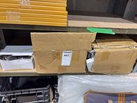 two main cardboard boxes containing the lot