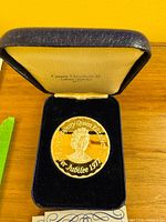 medal in presentation case showing obverse design