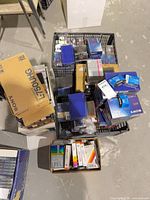 Crates and box filled with sealed Sony audio and Betamax tapes