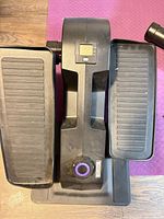 Top view of Cubii elliptical showing pedals and digital display