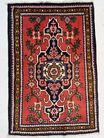Full view of Ardebil rug showing entire design and fringe