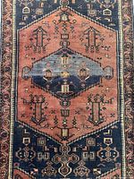 Full view of Saveh rug showing pattern and borders