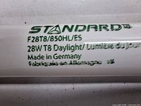 Close-up of tube branding and specifications