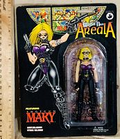 Front of sealed Warrior Nun Areala Shotgun Mary action figure on card showing figure and accessories
