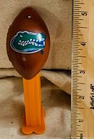 Front view showing Gators logo and scale