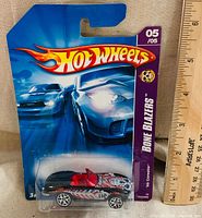 Front of blister card showing Hot Wheels Bone Blazers ’65 Corvette 05/05