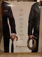 Front view of poster showing full artwork and cast list