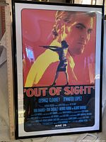 Framed Out of Sight movie poster showing artwork, cast credits and frame detail