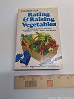 Front cover of book with ruler for scale