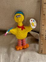 Front view showing Big Bird details and ruler for height