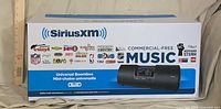 Front view of retail box showing SiriusXM universal boombox image and branding