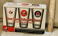 Front view of original box showing three Team Canada collectible glasses and capacity details