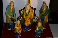 Group view of all five mud man figurines