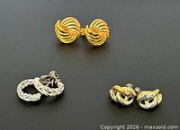 Three Napier clip-on pairs in varied metal tones