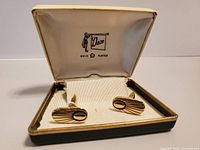 Gold-plated Daco cufflinks in original hinged box