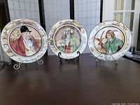 Front view of three character plates