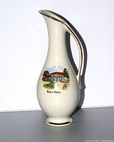 Full view of cream ceramic pitcher with Baden-Baden image