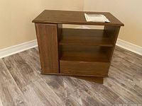 front angled view showing overall stand and swivel base