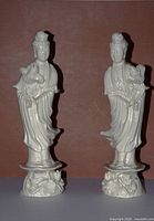 Front view of both porcelain Guanyin statues