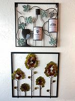 Both metal wall art pieces side by side showing full designs.