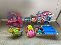 Overall lot view showing all toys together