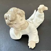Top view of Lladro Angel Lying Down porcelain figurine