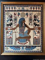 Front view of framed Egyptian needlepoint artwork