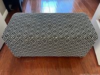 Top view of upholstered storage bench closed