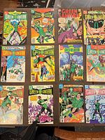 All 12 Green Lantern comics laid out, cover art visible