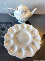 Teapot and deviled egg dish full view