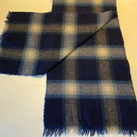 Full view of plaid wool scarf showing overall pattern
