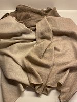 Folded tri-tone scarf showing overall colours and fabric texture