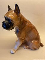 Left side view of ceramic boxer figurine