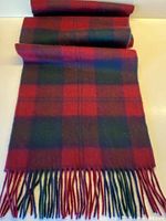 Full view of wool plaid scarf showing pattern and fringe