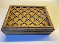 Top view showing lattice criss-cross carved lid