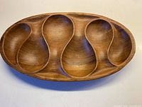 Top view showing full oval tray and five compartments