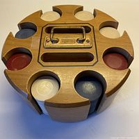 Top view of wooden poker chip carousel loaded with chips