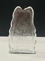 Front view showing embossed Viking design and overall shape