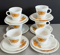 Full 17-piece Sunflower pattern set stacked