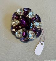 Front view showing purple and clear crystals arrangement