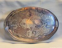 Top view showing full engraved surface and overall shape