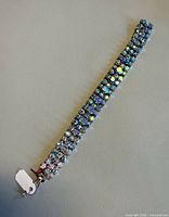 Front view showing three rows of blue and aurora borealis rhinestones