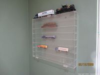 Full view of acrylic display case with all models inside